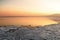 Sunset on the sea - ice - floe. Poland, Gdynia