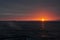 Sunset in the Sea of Japan. Cruiser `Varangian`.