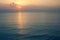 Sunset Sea over the Horizont. Beautiful Ocean Sunshine Landscape, Shimmering Twilight with yellow colors, Warm marine dusk Sun, Re