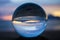 Sunset Seascape Captured in Glass Ball with Outrigger Canoe in S