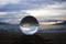 Sunset Seascape Light Reflected in Ocean Through Glass Sphere