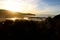 Sunset on a secluded golden bay beach