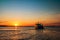 Sunset with ship sailing to the Brijuni Islands in Fazana, Croatia