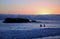 Sunset on shoreline below Heisler Park in Laguna Beach, California