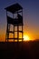 Sunset silhouette of the lifeguard tower
