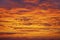 Sunset sky background. Dramatic sunset sky with evening sky clouds lit by bright sunlight - natural city sunset sky landscape vie