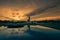 Sunset sky and Buddha statue at  Phutthamonthon,a Buddhist park in Nakhon Pathom Province of Thailand.