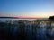 Sunset sky on lake in finland calm coast water