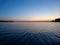 Sunset sky on lake in finland calm coast water