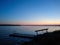 Sunset sky on lake in finland calm coast water