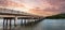 Sunset sky over bridge over Hickory Pass leading to the ocean in Bonita Springs