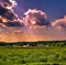 Sunset sky over a farm homestead