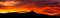 Sunset sky panorama with silhouette of Jested Mountain Ridge, Liberec, Czech Republic, Europe