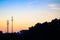 Sunset sky with silhouette antenna