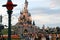 Sunset At Sleeping Beauty Castle At Disneyland Paris With Crowd