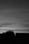 sunset smokey black and white soft flowing clouds vertical with footer text area