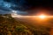 Sunset and storm cloud