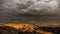 Sunset and storm clouds, Badlands National Park, South Dakota