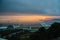 Sunset .The sun goes out on the edge of the Caspian Sea . Amazing view of clear sea landscape with cloudy sky as a background Suns