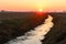 Sunset sunlight horizon classic generic Po Valley landscape panorama nature ditch river ice winter