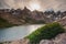 Sunset and sunrise on Laguna Toncek lake. Nahuel Huapi National Park. Camping green tent and the views of the Andes mountains and