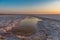 Sunset or sunrise on salt lake Baskunchak (Russia