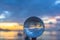 Sunset sunrise view inside crystal ball..The natural view of the sea and sky are unconventional and beautiful.