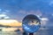 Sunset sunrise view inside crystal ball..The natural view of the sea and sky are unconventional and beautiful.