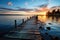 Sunset symphony pier silhouette amidst dazzling colors, sunrise and sunset wallpaper