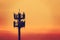 Sunset and Tall mast with cellular antenna