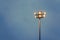 Sunset and Tall mast with flood lights at sports park