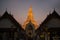 Sunset time at the main feature of Wat Arun Ratchawararam Ratworamahawihan Temple of Dawn .