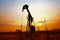 Sunset time of oil pump, oil industry equipment