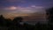 Sunset timelapse from cap gros lighthouse in palma de mallorca island. sun setting in the sea at night. pristine landscape with