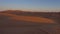 Sunset Timelapse wide shot of dunes of Erg Chebbi Desert at Sunset, Morocco