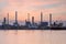 Sunset tone over oil refinery river front