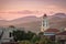 Sunset touching the church and mountains at Trinidad