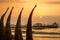 The sunset with traditional boat craft at Huanchaco town, Peru