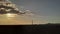 Sunset train clouds skyline glow cloud mountain with powerline and light rays