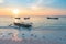 Sunset tropical beach caribbean sea wooden boats at Pasir Panjang. Indonesia Moluccas archipelago, Kei Islands, Banda Sea. Top