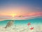 Sunset at turquoise ocean with underwater view, Tropical sea with island and starfish and fishes