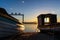 Sunset and two fishing boats at the Abraao beach - Florianopolis - Brazil