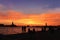 Sunset in venice, Silhouettes of people watching