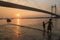 Sunset at Vidyasagar Setu bridge on river Hooghly.