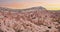 Sunset view from Aktepe Hill over Red valley in Cappadocia, Anatolia, Turkey. Goreme National Park