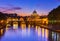 Sunset view of Basilica St Peter and river Tiber in Rome