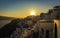 Sunset view of the blue dome churches of Santorini