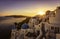 Sunset view of the blue dome churches of Santorini