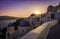 Sunset view of the blue dome churches of Santorini