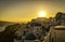 Sunset view of the blue dome churches of Santorini